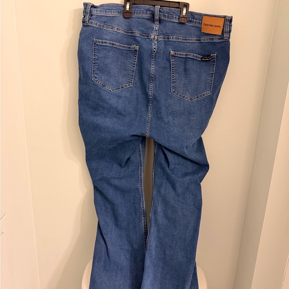 Calvin Klein Jeans Mid-Blue Flare Wide-Leg Jeans - Picture 2 of 6